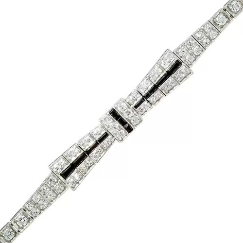 Art Deco Diamond and Onyx Bow Brooch.