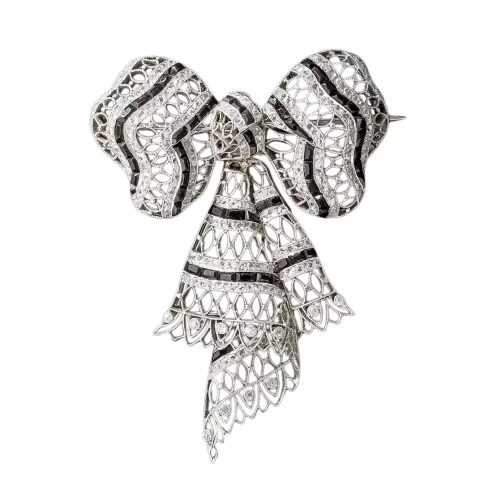 Edwardian Diamond and Onyx Bow Brooch.