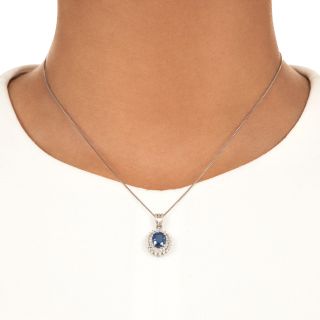 Estate 1.50 Carat Sapphire Double Diamond Halo Pendant