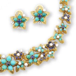 Boucheron Demi-Parure with Turquoise, Sapphires and Diamonds in Gold, c.1955. Photo Courtesy of Bonham's.